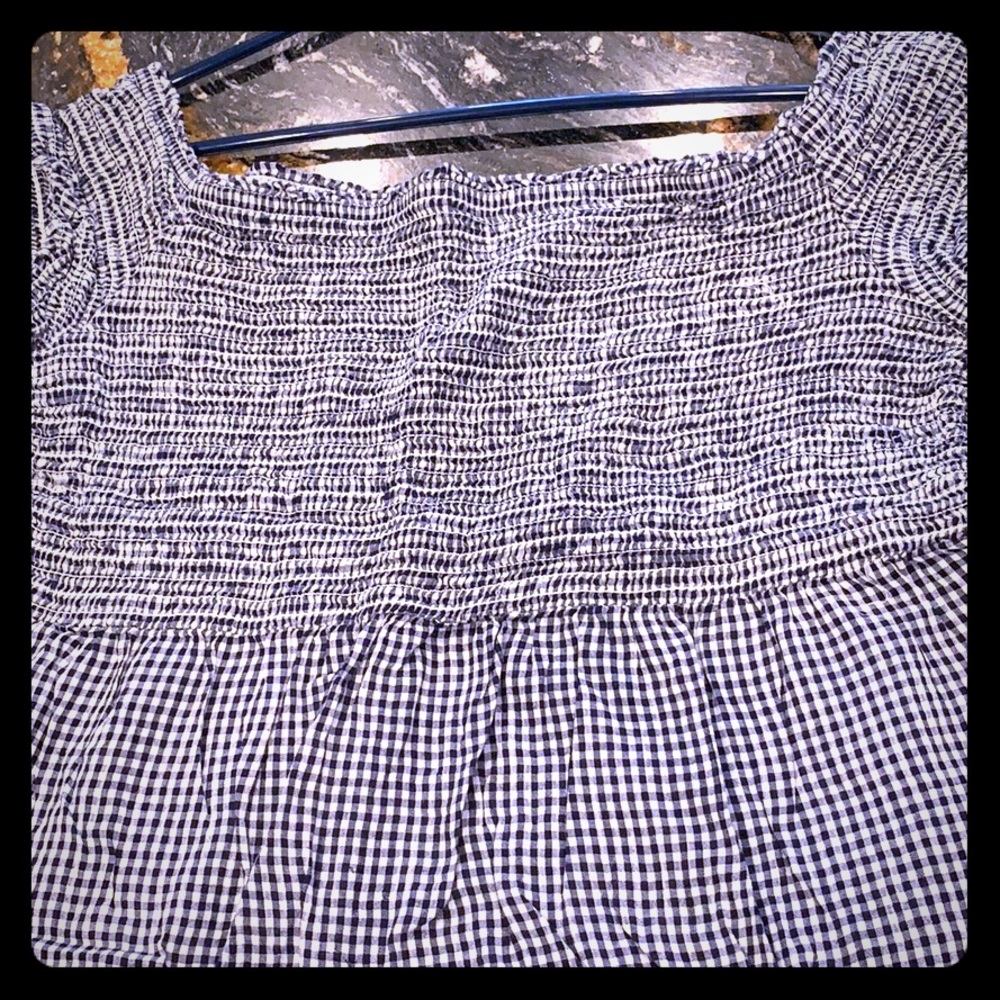 Rayon off the shoulder smocked top.